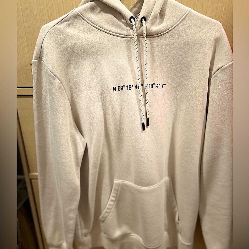 A small white H&M hoodie